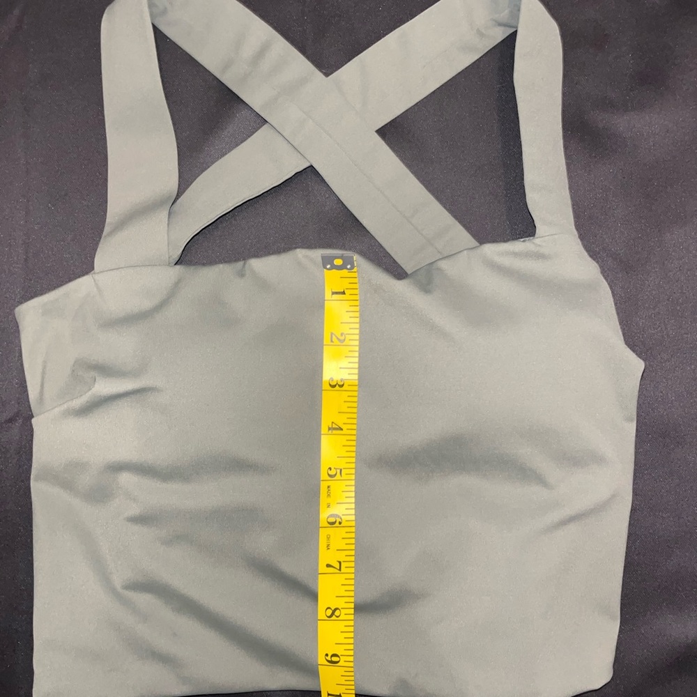 Stylish top, with cross straps in the back